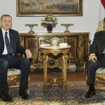 Egyptian President Mursi meets with Turkish PM Erdogan at the Presidential Palace in Cairo