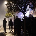 Riot police fire teargas during a protest against Turkey's ruling Ak Party (AKP) and Prime Minister Tayyip Erdogan