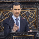 Syria's President Bashar al-Assad delivers a speech to Syria's parliament in Damascus