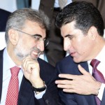 Iraq's Kurdistan Prime Minister Nechirvan Barzani speaks with Turkey's Energy Minister Taner Yildiz at Iraq-Kurdistan Oil and Gas Conference at Arbil