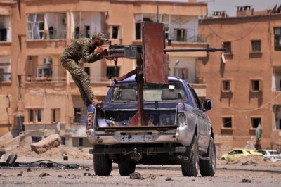 A YPG fighter mans a mounted machine gun in the northeastern Syrian province of Hasakeh (AFP) 