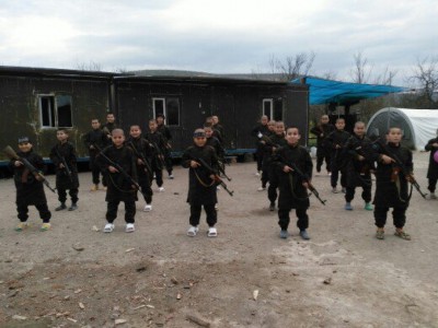 Photo purportedly showing the TIP training children in weapons in northwestern Syria