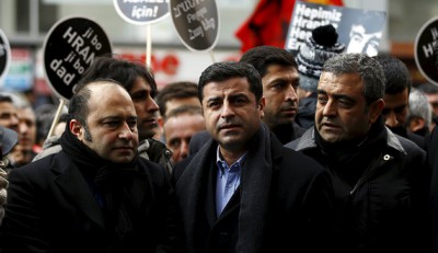 Co-chair of the pro-Kurdish Peoples' Democratic Party (HDP), Selahattin Demirtas (C) attends a ceremony to mark the ninth anniversary of the killing of Turkish-Armenian editor Hrant Dink in Istanbul January 19, 2016. REUTERS/Osman Orsal - 