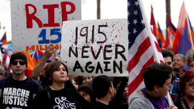 Thousands brought flags, signs and photos to the March for Justice commemorating the 100th anniversary of the Armenian genocide, on Sunset Blvd. in Hollywood on Friday, April 24, 2015. Glendale  school officials wanted to locally brand the day, which until now was referred to only as a non-instructional day. (Raul Roa / Staff Photographer)