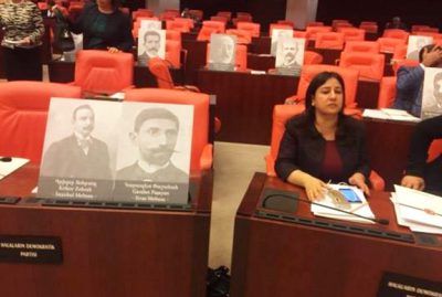 Photos of Ottoman Armenian parliament members rested on the seats of the Turkish National Assembly