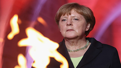 German Chancellor Angela Merkel commemorating the 100th anniversary of the World War I battle of Verdun | Sean Gallup/Getty Images