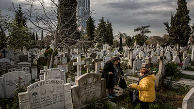  Turkish-Armenian women searching for the graves of relatives in the Armenian cemetery in Istanbul last year, the 100th anniversary of the genocide. Credit Bryan Denton for The New York Times 