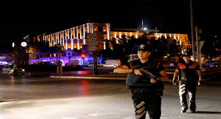 Police officers near the Turkish military headquarters in Ankara on Friday. Credit Tumay Berkin/Reuters 