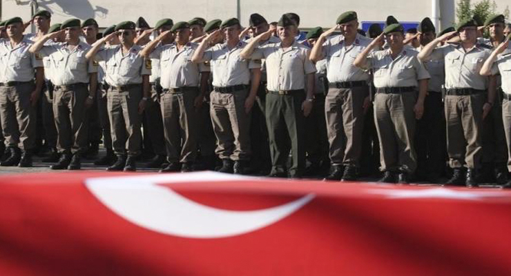 Turkish police officers salute during a funeral ceremony for police officer Nedip Cengiz Eker in Marmaris, Turkey, July 16, 2016. REUTERS/KENAN GURBUZ