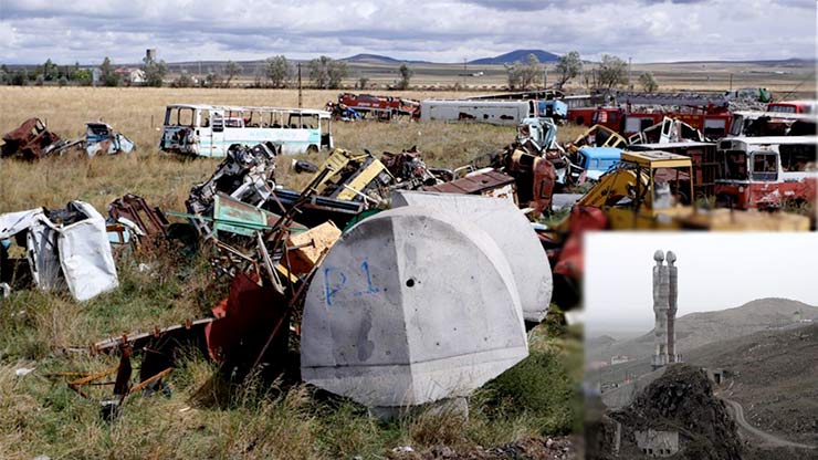 The two heads of the Statue Of Humanity lie in a municipal dump on the outskirts of Kars.